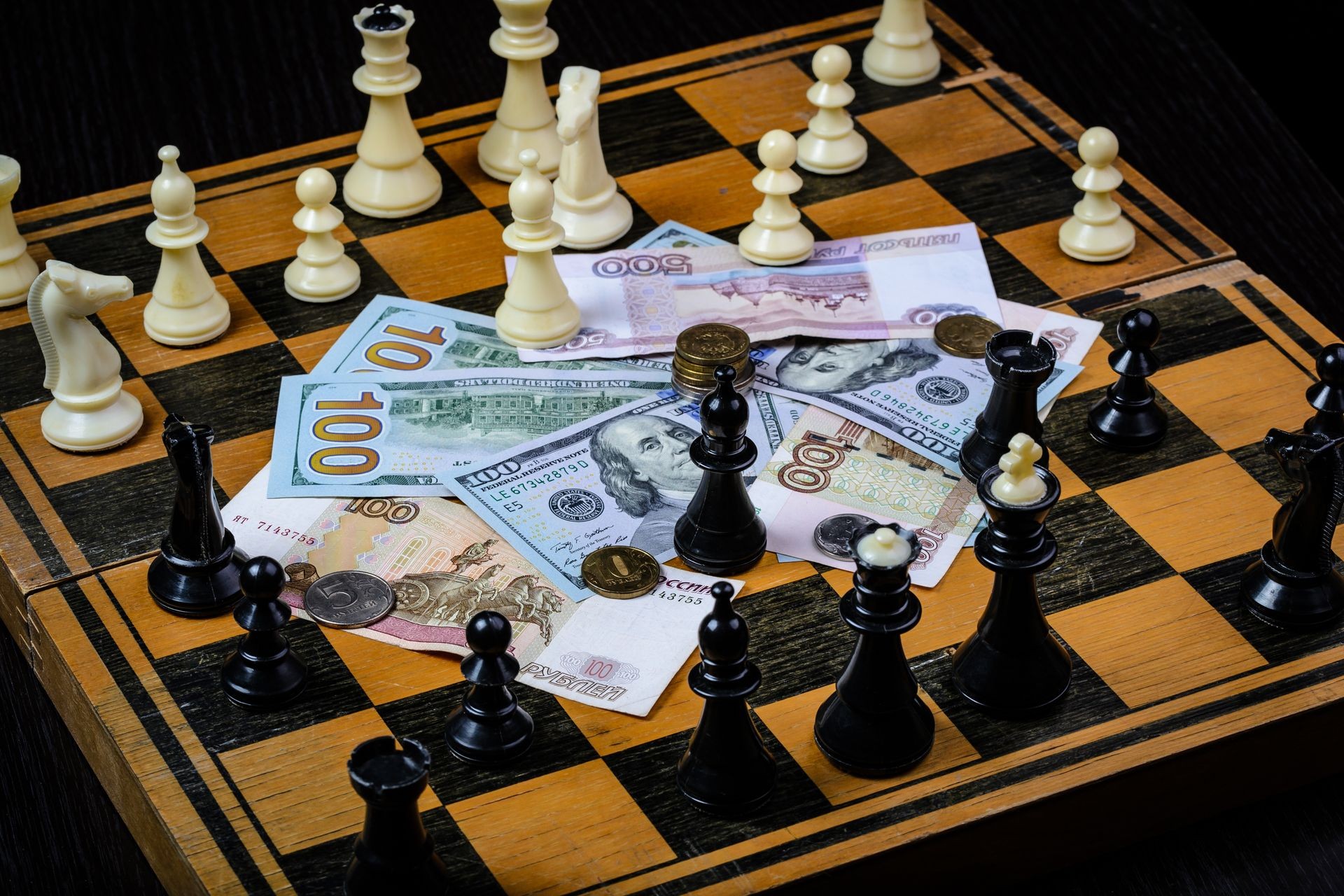 Chess and money on a dark background Chess and money on a dark background